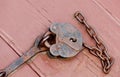 Antique lock and chain on wood