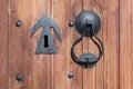 Antique lock and door knocker on the background of a natural wooden door. Shot in the Old Town in Plovdiv, Bulgaria Royalty Free Stock Photo