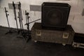 Antique loudspeaker set resting atop a vintage suitcase, evoking a sense of nostalgia Royalty Free Stock Photo