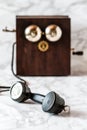 Antique Magneto Hand Crank Telephone Set on Marble Background Royalty Free Stock Photo