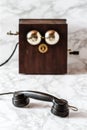 Antique Magneto Hand Crank Telephone Set on Marble Background Royalty Free Stock Photo