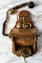 Antique Magneto Hand Crank Telephone Set on Marble Background Royalty Free Stock Photo