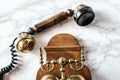 Antique Magneto Hand Crank Telephone Set on Marble Background Royalty Free Stock Photo