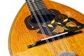 Antique mandolin isolated on white background