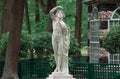 Antique marble statue in Peterhof lower park. Aviary Pavilion in the Lower Garden. Peterhof, Saint-Petersburg, Russia.