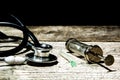 Antique medical tools on a wood background Royalty Free Stock Photo