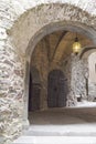 Antique medieval stone arch inside the castle
