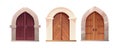 Antique medieval wooden door with metal round handle and lined with stones. Gothic entrance, gate in a castle, church or Royalty Free Stock Photo