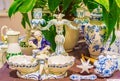 Antique tableware set and boy figurine Meissen porcelain Germany Royalty Free Stock Photo