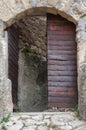 Antique metal door in Chufut-Kale in Crimean Mountains, medieval  city-fortress,  national monument of  Karaites, now in ruins Chu Royalty Free Stock Photo