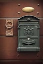 Antique metal mail box and old door knob Royalty Free Stock Photo