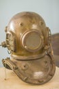 Antique metal scuba helmet, heavy diving equipment with air supp Royalty Free Stock Photo