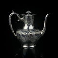 antique metal teapot. silver tea service. Royalty Free Stock Photo