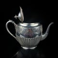 Antique metal teapot. silver tea service. Royalty Free Stock Photo