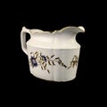 antique milk jug with floral pattern. Royalty Free Stock Photo