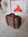 Antique miniature suitcase in the doll room Royalty Free Stock Photo