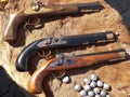 Antique muzzle-loader pistols