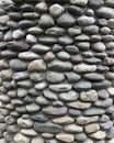 Antique natural stonewall or colored stone background and pattern Royalty Free Stock Photo