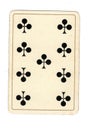 An antique nine of clubs playing card.