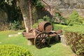 Antique oak wine barrel with wagon and wheel