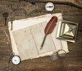 Antique office supplies and writing tools on wooden desk