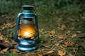 Antique oil lamp inside the forest