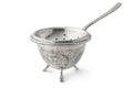 Antique old fashion silver tea strainer and standon white background Royalty Free Stock Photo