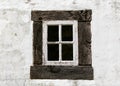Antique old residential window frame on a white background with panes blacked out. Royalty Free Stock Photo