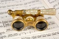 Antique Opera Glasses on a Music Score