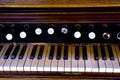 Antique Orgon Keyboard and Pulls Royalty Free Stock Photo