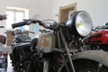 Antique Peugeot motorcycle with patina at Chateau de Savigny near Beaune in Burgundy, France