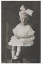 Antique photograph girl with big bow