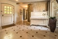 Antique piano in hallway