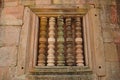 Antique pillar at a window from stone castle