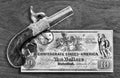 Antique Pistol and Confederate Money