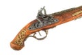 Antique pistol inlaid handle and trigger mechanism.