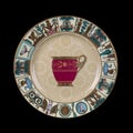 Antique plate with Egyptian ornaments. plate in Egyptian style