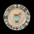 Antique plate with Egyptian ornaments. plate in Egyptian style