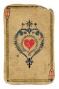 Antique playing card ace of hearts isolated on white