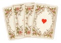 Antique playing cards showing four aces.