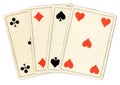 Antique playing cards showing four fives.