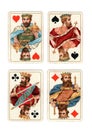 Antique playing cards showing four kings.