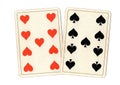 Antique playing cards showing a pair of nines.