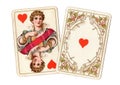 Antique playing cards showing a queen and ace of hearts. Royalty Free Stock Photo