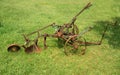 Antique plow at a farm in the summer field