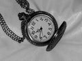Antique pocket watch on a black and white photo Royalty Free Stock Photo