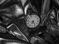 Antique pocket watch on a black and white photo Royalty Free Stock Photo