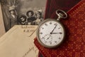 Antique pocket watch with Victorian items. Old books and photographs. Group photo of the 19th century. Vintage theme background Royalty Free Stock Photo