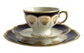 Antique porcelain cup with saucer and plate Royalty Free Stock Photo