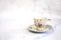 Antique porcelain tea cup on white background copy space. traditional English vintage ceramics Royalty Free Stock Photo